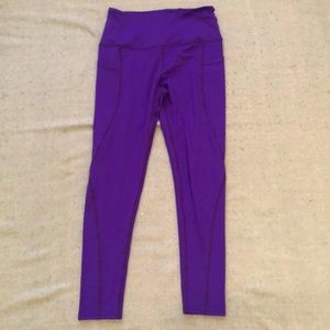 Purple athletic leggings with pockets